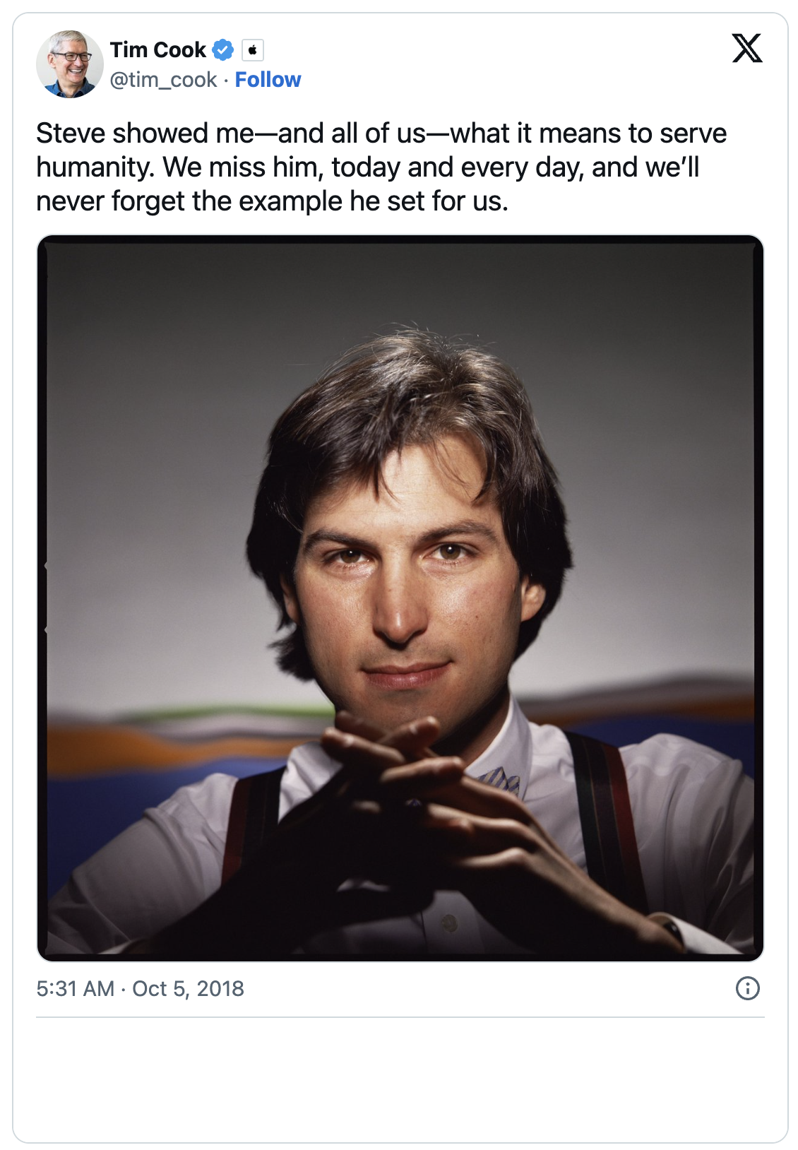 Tweet by Tim Cook remembering Steve Jobs, with a portrait of a young Steve Jobs looking into the camera.